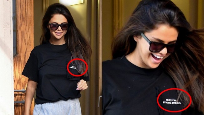 Mặc tin đính hôn của Justin, Selena Gomez ngầm dằn mặt với câu slogan trên áo